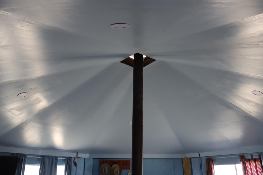 Ceiling shot of interior of new white dome roof