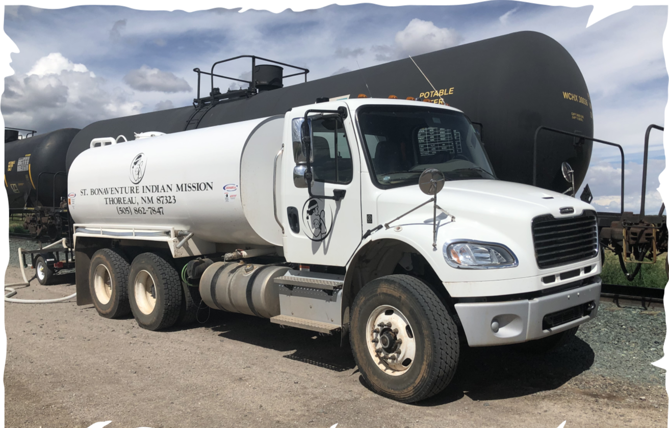 A white water truck with the signage 